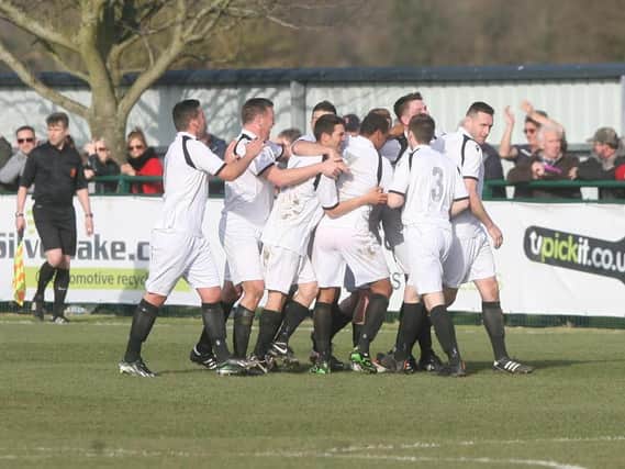 United celebrate a goal in their Vase semi-final v Sholing in 2014 / Pictures: Michael Cunningham and Stuart Martin