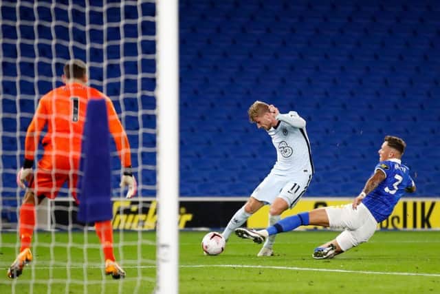 Ben White makes a crucial challenge on Chelsea's Timo Werner