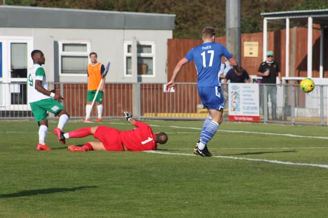 Jordy Mongoy lifts the ball over the keeper for the second / Picture: Martin Denyer