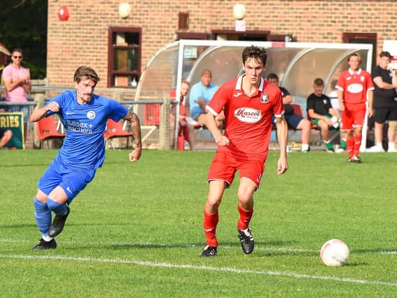 Jack Troak in action against Peacehaven. Picture by Chris Neal