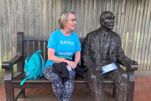 Kathy Gore with Rudyard Kipling statue at Burwash SUS-200922-095724001