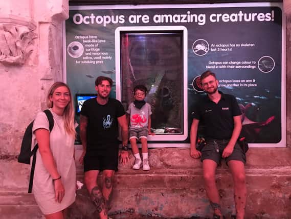 Loui with his family and SEA LIFE Brighton staff