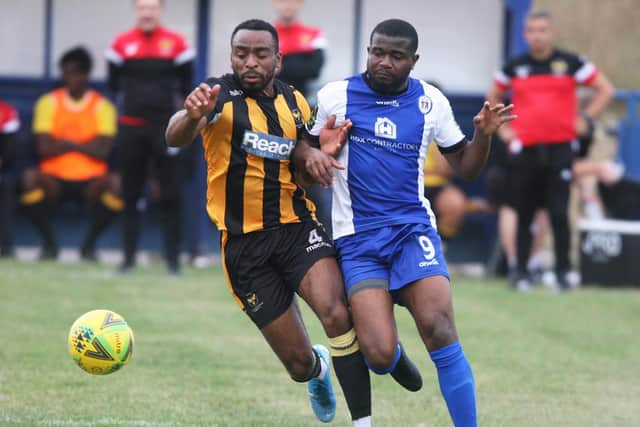 Jerome Beckles and Samual Ogunseye battle for the ball on Saturday