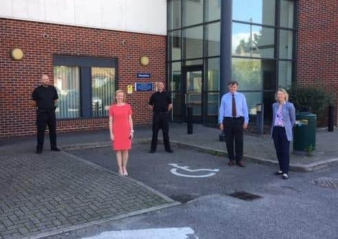 Carl Knapp, Claire Taylor and Jason Wilson at Chichester Custody Centre with the High Sheriff, Dr Tim Fooks, and his wife Sarah Fooks
