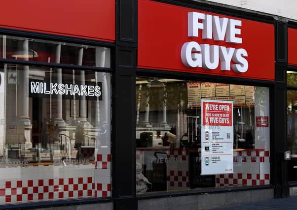 An example of an existing Five Guys restaurant (Photo by Ross Kinnaird/Getty Images) SUS-200923-170520001