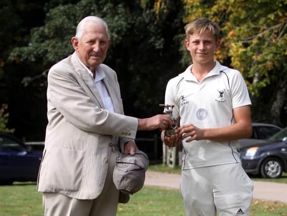 Alfie Hunter receives the batting award from grandfather Peter / Picture: Ron Hill