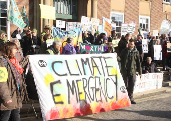 Climate campaigners protesting in Chichester