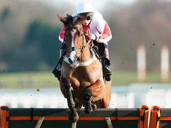 Goshen and Jamie Moore in full flight at Ascot / Picture: Getty