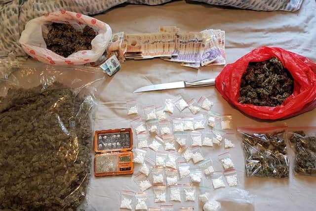 Drugs, cash and a weapon seized from a flat in Church Road, Hove
