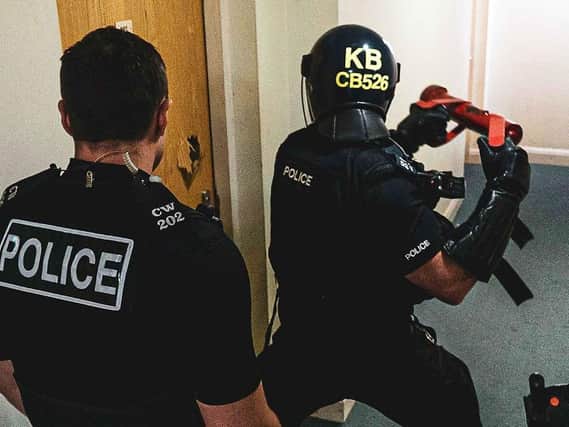 Police executed warrants in connection to an investigation into 'county lines' drug dealing