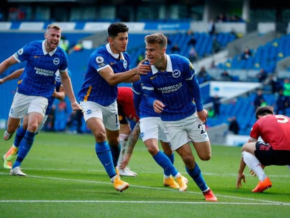 Solly March after he scored in the 95th minute to make the game 2-2