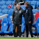 Manchester United manager Ole Gunnar Solskjaer with Brighton head coach Graham Potter