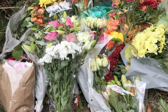 Flowers and tributes left at the scene of the fatal collision in Crowborough