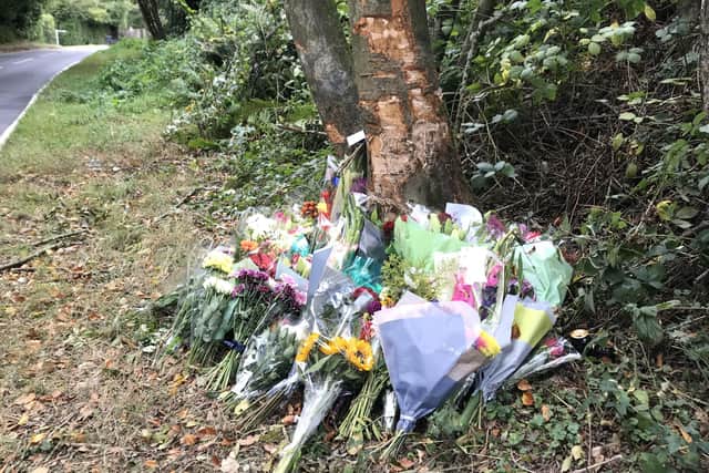 Flowers and tributes left at the scene of the fatal collision in Crowborough