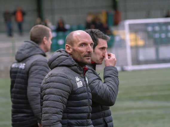 Miles Rutherford, Danny Potter and Graeme Gee on the touchline at Whyteleafe / Picture: Neil Holmes