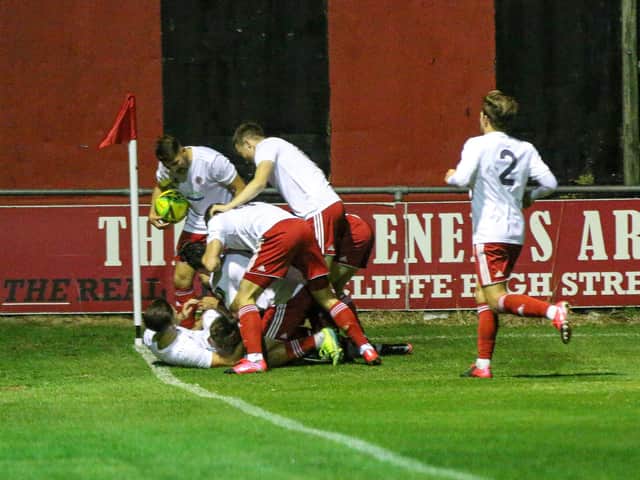 Worthing celebrate on their way to victory at Lewes / Picture: James Boyes