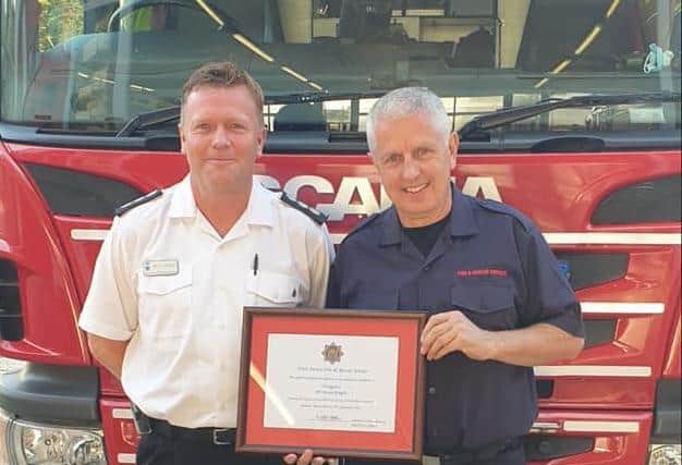Kevin Knight (right) joined West Sussex Fire and Rescue Service in 2003. Photo: West Sussex Fire and Rescue Service