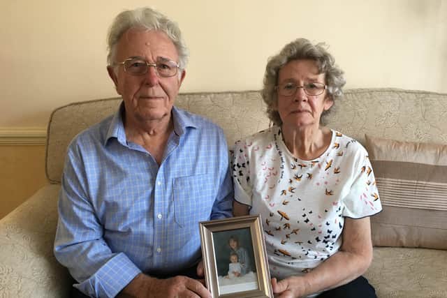 Peter and Elizabeth Skelton with a picture of their daughter Susan Nicholson