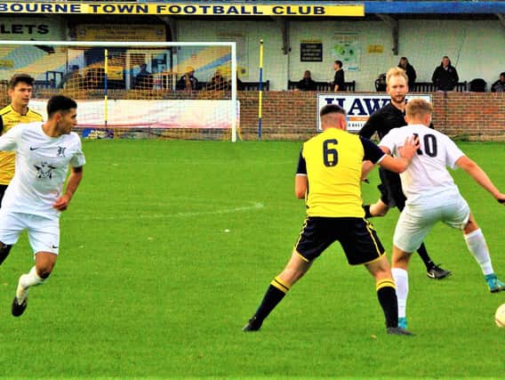 Two-goal Adam Grant (10) was a handful for Eastbourne Town defence. Picture by Spence Mitchell