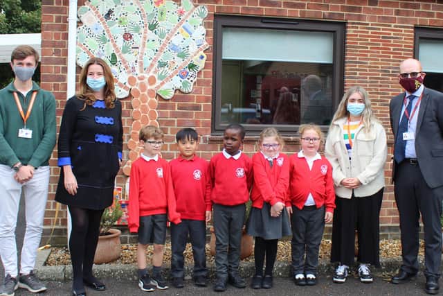 Chichester MP Gillian Keegan at the opening of The Bishop Luffa Learning Partnership at Rumboldswhyke CE Infants’ School, with year two pupils, Bishop Luffa School captains Ethan Storey and Freya Jones, and Bishop Luffa head teacher and trust chief executive Austin Hindman