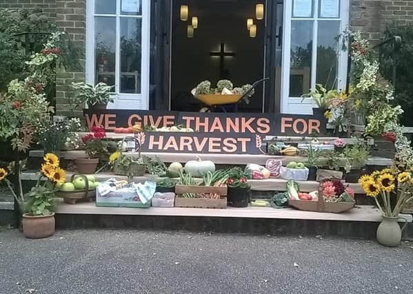 The Harvest display was placed outside this year at Trinity Methodist Church, Storrington SUS-200610-084346001