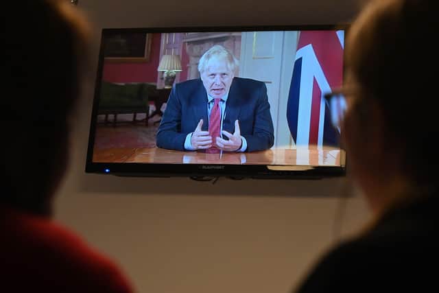 Boris Johnson addressing the nation about the coronavirus pandemic. Photo by PAUL ELLIS/AFP via Getty Images