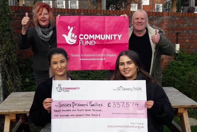 Sussex Prisoners’ Families directors Rachelle Gold and Denis Byrne with volunteers Sarah and Naomi celebrating an award from the National Lottery Community Fund