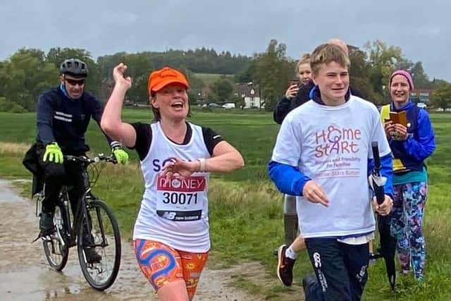 Sophie Crawford at the finishing line at the Cowdray Ruins with her 16-year-old son Archie Crawford