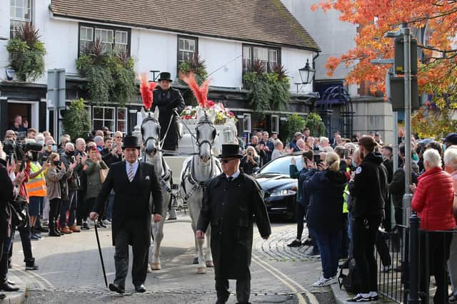 Crawley High Street was packed with people paying respects to Alan Minter. Picture by Eddie Mitchell