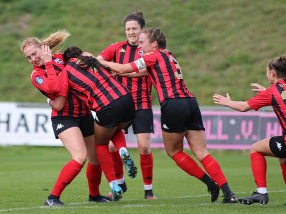 They're celebrating not fighting! Lewes players celebrate what turned out to be the only goal against Blackburn / Picture: James Boyes