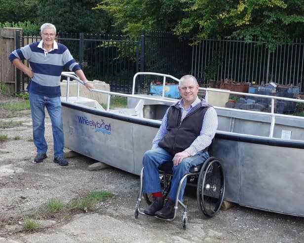 Wey & Arun Canal Trust director, John Reynolds, and Wheelyboat Trust director, Andy Beadsley SUS-201210-153255001