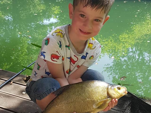 This young Sussex angler is among many who have been keen to get out to the lakes and river banks