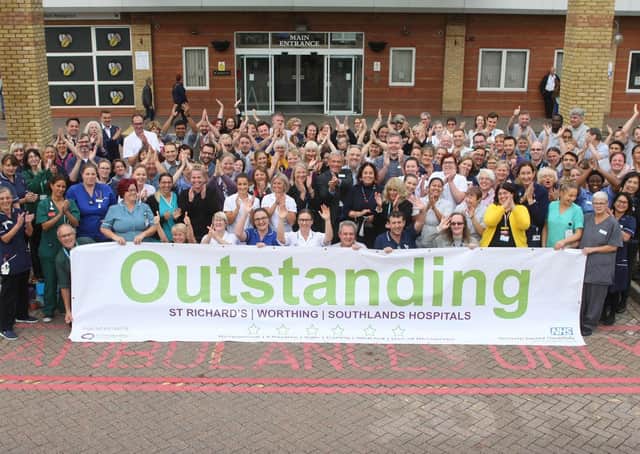Worthing Hospital staff celebrating the 'outstanding' rating