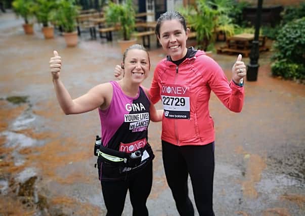 Gina Leadbeatter (left) and Kate Leyshon from Horsham Ladies Rugby ran the virtual London Marathon together around the town SUS-201014-124752001