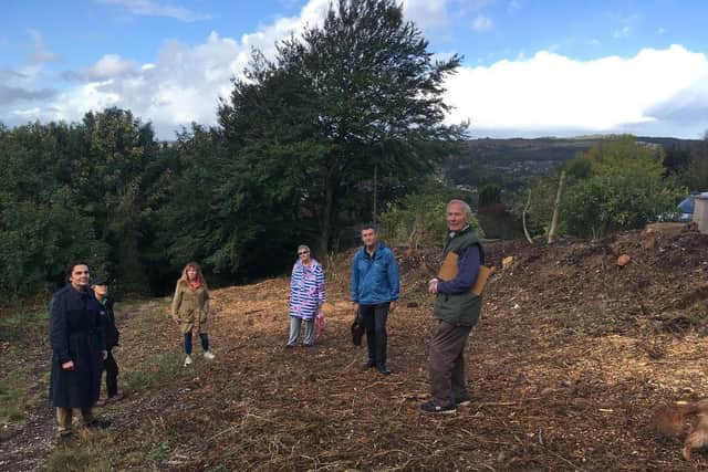 Councillor Matthew Bird, cabinet member for sustainability at Lewes District Council, and Jan Knowlson, South Downs National Park ranger, meeting with some of the concerned residents at the site