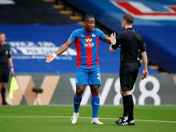 Palace striker Michy Batshuayi pleads for a penalty and referee Stuart Atwell obliged
