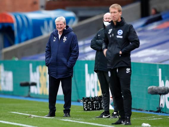 Roy Hodgson (left) admitted he was left 'bitterly disappointed' by Brighton's late equaliser (Photo by Peter Cziborra - Pool/Getty Images)