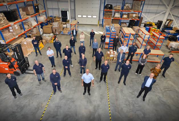 Staff pictured inside Drallim Industries, Drury Lane, St Leonards. SUS-201020-101333001