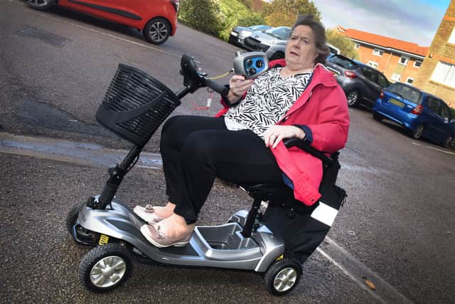 Marge Kaill pictured on her mobility scooter in Bexhill.