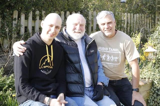 Matt (left) with his grandfather, Terry and father, Chris. Picture: Cancer Research UK