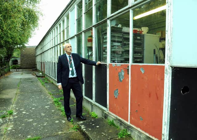 Business manager Mark Nicholds by one of the Bishop Luffa school buildings that needs replacing