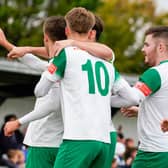 Bognor players celebrate with Ashton Leigh, who downed East Thurrock with a hat-trick / Picture: Lyn Phillips