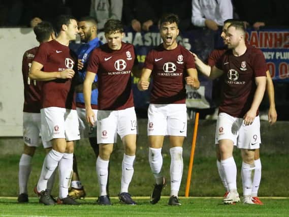 United players celebrate with Davide Rodari after the striker scores his first goal after injury in the win over Three Bridges / Picture: Scott White