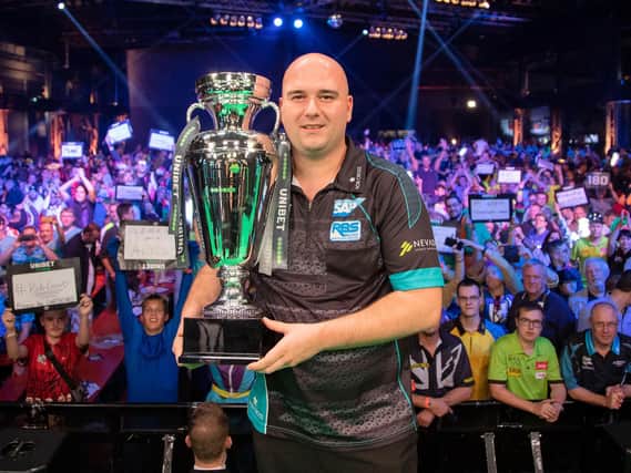 Rob Cross with the European trophy he is seeking to retain in Germany later this week / Picture: PDC Europe