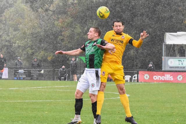 Conditions not made for football... the rain lashes down as Burgess Hill do battle with Ramsgate / Picture: Chris Neal