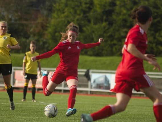 Beth Kincaid shoots in Worthing's cup clash with Crawley Wasps / Picture: Kia Addison