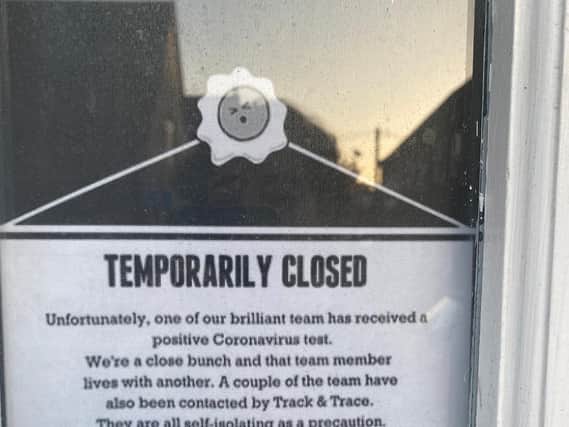 A notice in the restaurant's window