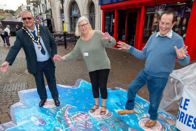 Littlehampton Town Council which has installed two pieces of 3D art in Littlehampton’s High Street in October as part of the town council and Arun District Council’s jointly funded town centre events initiative. Left to right: town mayor David Chace, councillor Dr James Walsh and Jill Long.
