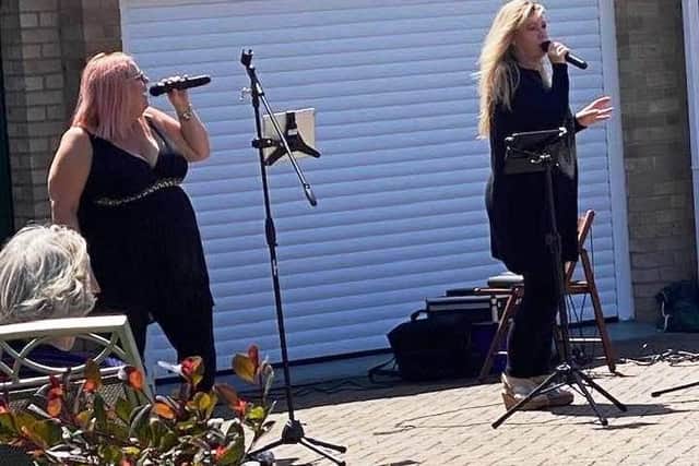 Tracey O'Reilly and Melissa White, female duo HALO, performing to celebrate the 72nd anniversary of the NHS and raise money for Sussex Community NHS Foundation Trust
