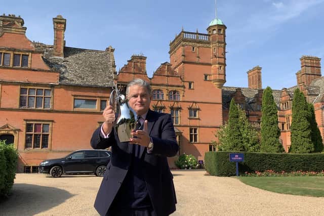 Cottesmore headteacher Tom Rogerson with the Tatler  'Prep School of the Year' trophy